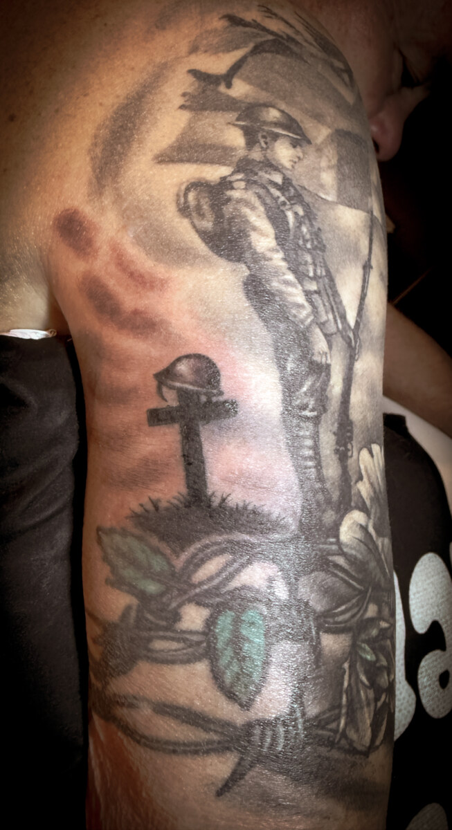 Remembrance Cross and Helmet Tattoo
